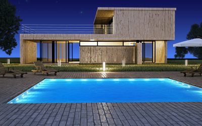 Modern house with swimming pool in night vision